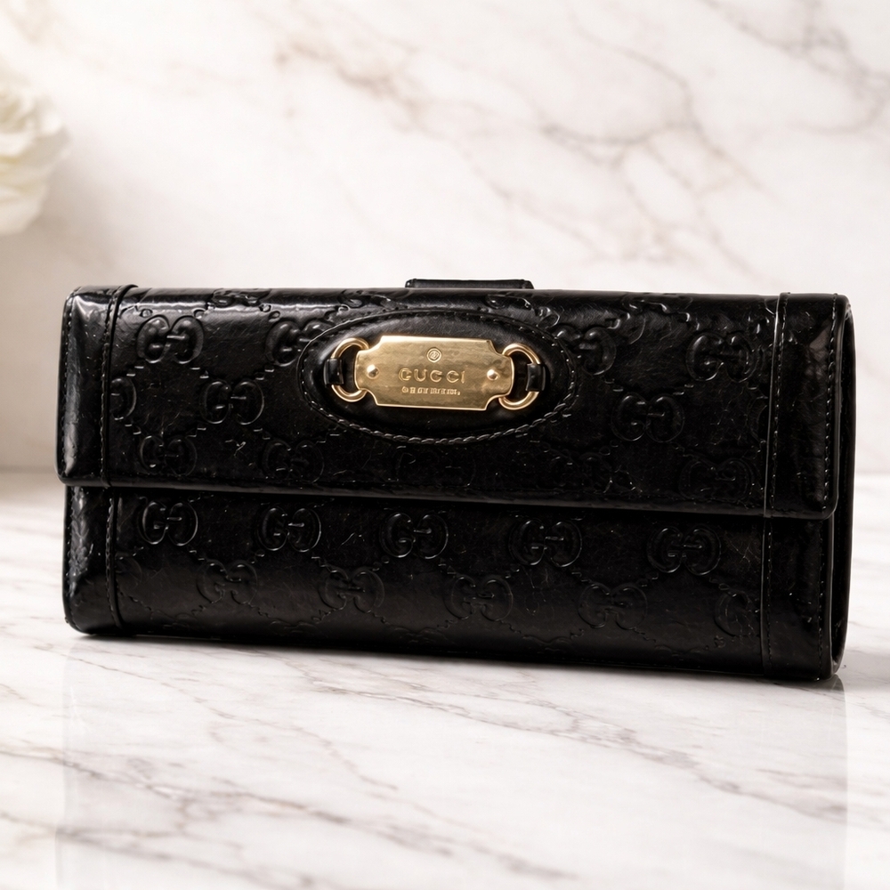 Gucci Black Embossed Leather Wallet